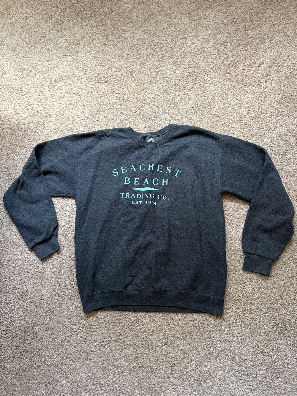 Women's size large dark grey and teal Seacrest sweatshirt